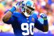New York Giants defensive end Jason Pierre-Paul (90) walks the field during the first half of an NFL football game, Sunday, Oct. 19, 2014, in Arlington, Texas. (AP Photo/LM Otero)