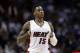 Miami Heat guard Mario Chalmers (15) stands on the court in the second half of an NBA basketball game against the Indiana Pacers, Wednesday, Nov. 12, 2014, in Miami. The Pacers defeated the Heat 81-75. (AP Photo/Lynne Sladky)