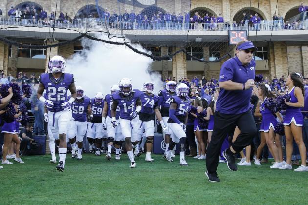 Dec 6, 2014; Fort Worth, TX, USA; TCU Horned Frogs head coach Gary Patterson runs out of the tunnel before the game against the Iowa State Cyclones at Amon G. Carter Stadium. Mandatory Credit: Kevin Jairaj-USA TODAY Sports