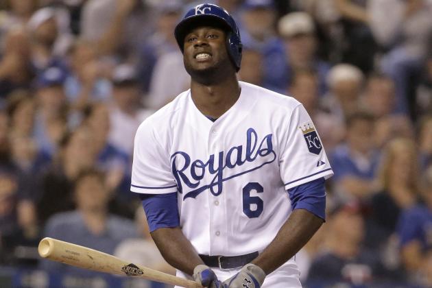 Kansas City Royals' Lorenzo Cain walks off after striking out during the eighth inning of a baseball game against the Minnesota Twins Thursday, July 2, 2015, in Kansas City, Mo. (AP Photo/Charlie Riedel)
