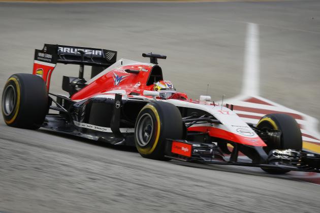 Marussia driver Jules Bianchi of France steers his car during the third practice session of the Singapore Formula One Grand Prix on the Marina Bay City Circuit in Singapore, Saturday, Sept. 20, 2014. (AP Photo/Ng Han Guan)