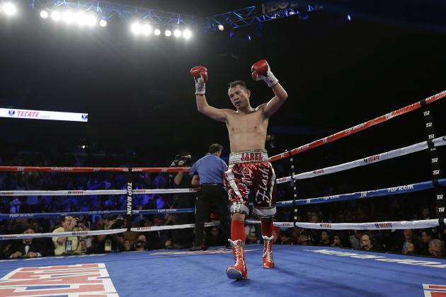 Nonito Donaire celebrates his win over Vic Darchinyan during round 9 of their featherweight rematch, Saturday, Nov. 9, 2013, in Corpus Christi, Texas. (AP Photo/Eric Gay)