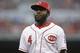 Cincinnati Reds second baseman Brandon Phillips (4) walks back to the dugout in the third inning of a baseball game against the Detroit Tigers, Wednesday, June 17, 2015, in Cincinnati. The Reds won 8-4. (AP Photo/John Minchillo)