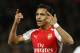 Arsenal's Alexis Sanchez gestures toward the assistant referee as he disputes a decision during their English Premier League soccer match between Arsenal and Swansea City at the Emirates stadium in London, Monday,May 11, 2015. (AP Photo/Alastair Grant)