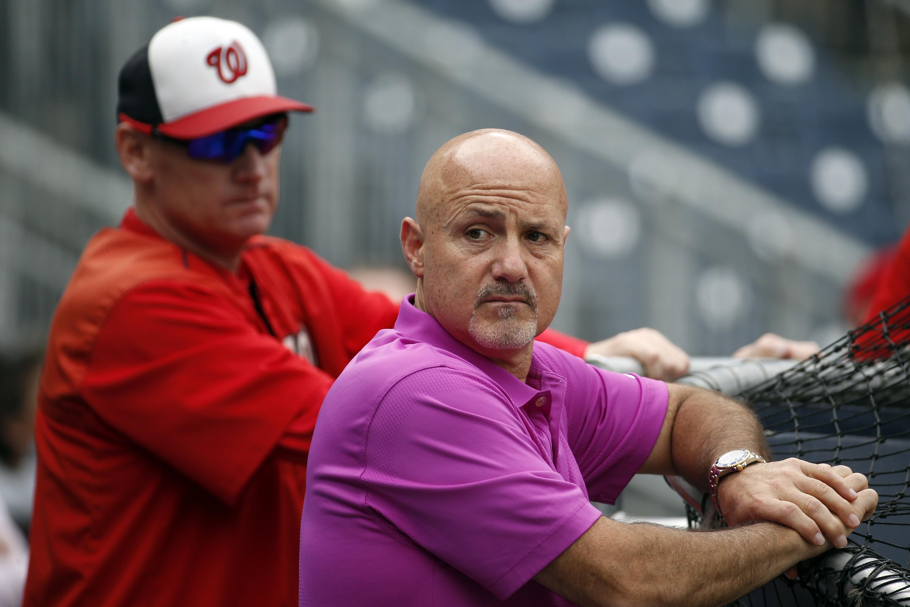 Washington Nationals General Manager Mike Rizzo (L) and Matt