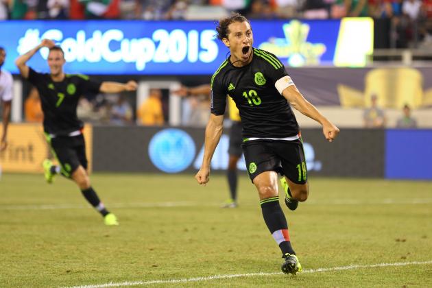EAST RUTHERFORD, UNITED STAES - JULY 19:  Andres Guardado of Mexico celebrates after scoring a goal to make it 1-0 in the last minute of the game from a controversial penalty kick during the Gold Cup Quarter Final between Mexico and Costa Rica at MetLife Stadium on July 19, 2015 in East Rutherford, New Jersey.  (Photo by Matthew Ashton - AMA/Getty Images)