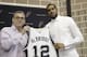 LaMarcus Aldridge, right, poses with San Antonio Spurs general manager R.C. Buford, left, and his new jersey during a news conference at the team's practice facility as he is formally introduced after he signed with the San Antonio Spurs NBA basketball team, Friday, July 10, 2015, in San Antonio. (AP Photo/Eric Gay)