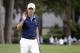 Bae Sang-moon, of South Korea, waves after making a birdie on the ninth hole during the second round of the RBC Heritage golf tournament in Hilton Head Island, S.C., Friday, April 17, 2015. (AP Photo/Stephen B. Morton)