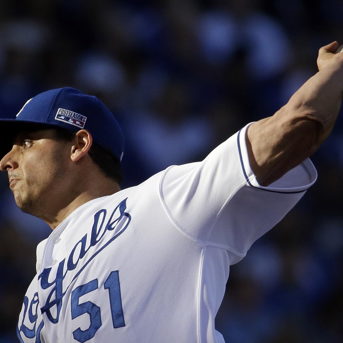 Kansas City Royals pitcher Jason Vargas (L) stops dead in his