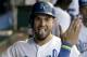 Kansas City Royals' Eric Hosmer celebrates in the dugout after hitting a solo home run during the fourth inning of a baseball game against the Pittsburgh Pirates Wednesday, July 22, 2015, in Kansas City, Mo. (AP Photo/Charlie Riedel)