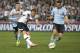 Tottenham Hotspur player Harry Kane, center, kicks for a goal during their friendly match against Sydney F.C. in Sydney, Australia, Saturday, May 30, 2015. (AP Photo/Rob Griffith)