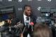 TORONTO, CANADA - JULY 9: DeMarre Carroll #5 of the Toronto Raptors signs during a press conferences on July 9, 2015 at the Air Canada Centre in Toronto, Ontario, Canada. NOTE TO USER: User expressly acknowledges and agrees that, by downloading and or using this Photograph, user is consenting to the terms and conditions of the Getty Images License Agreement. Mandatory Copyright Notice: Copyright 2014 NBAE (Photo by Ron Turenne/NBAE via Getty Images)