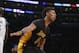 Los Angeles Lakers' Nick Young reacts after dunking the ball against the Minnesota Timberwolves during the second half of an NBA basketball game Friday, Nov. 28, 2014, in Los Angeles. The Timberwolves won 120-119. (AP Photo/Danny Moloshok)