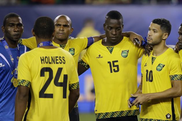 Jamaica players react after losing 3-1 in the CONCACAF Gold Cup championship soccer match against Mexico, Sunday, July 26, 2015, in Philadelphia. (AP Photo/Matt Rourke)