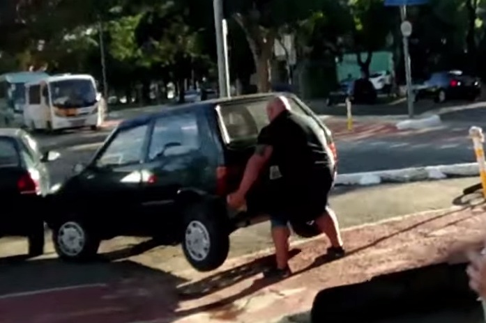Man Calmly Lifts Car Out of Bicycle Path, Continues on His Merry Way |  News, Scores, Highlights, Stats, and Rumors | Bleacher Report