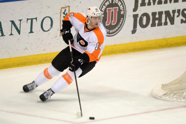 Philadelphia Flyers' Sean Couturier (14) skates against the St. Louis Blues in an NHL hockey game, Thursday, March 12, 2015, in St. Louis. (AP Photo/Bill Boyce)