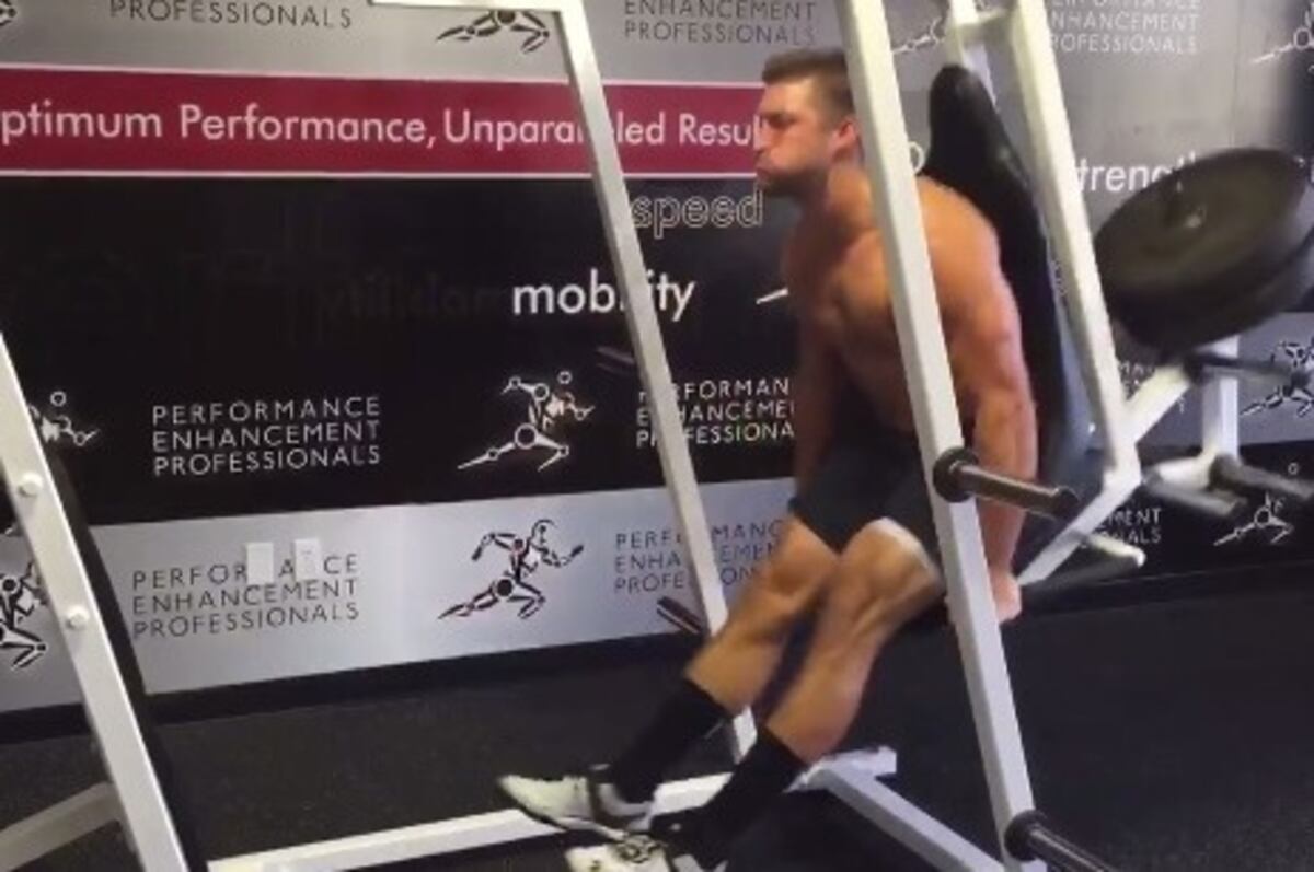 Tim Tebow Performs Interesting Leg Exercise Before 