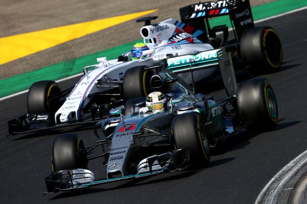 BUDAPEST, HUNGARY - JULY 26:  Lewis Hamilton of Great Britain and Mercedes GP drives next to Felipe Massa of Brazil and Williams during the Formula One Grand Prix of Hungary at Hungaroring on July 26, 2015 in Budapest, Hungary.  (Photo by Mark Thompson/Getty Images)