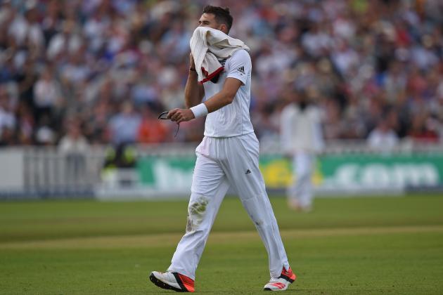 England's James Anderson walks back to the pavilion after coming off injured mid-over on the second day of the third Ashes cricket test match between England and Australia at Edgbaston in Birmingham, central England, on July 30, 2015. AFP PHOTO / PAUL ELLIS

RESTRICTED TO EDITORIAL USE. NO ASSOCIATION WITH DIRECT COMPETITOR OF SPONSOR, PARTNER, OR SUPPLIER OF THE ECB        (Photo credit should read PAUL ELLIS/AFP/Getty Images)