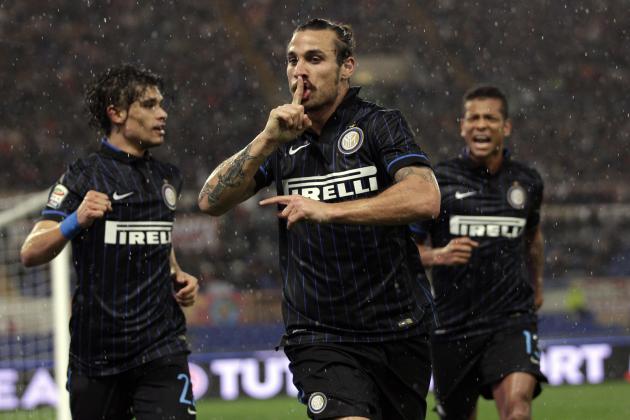 Inter Milan's Pablo Osvaldo, center, celebrates after scoring during a Serie A soccer match between Roma and Inter Milan, at Rome's Olympic Stadium, Sunday, Nov. 30, 2014. (AP Photo/Andrew Medichini)