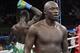 Antonio Tarver, center, walks away from Lateef Kayode, of Nigeria, after their cruiserweight boxing match in Carson, Calif., Saturday, June 2, 2012. The fight ended in a draw. (AP Photo/Jae C. Hong)