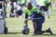 Seattle Seahawks defensive end Cliff Avril takes a break from drills during NFL football training camp on Friday, July 31, 2015, in Renton, Wash. (AP Photo/Stephen Brashear)