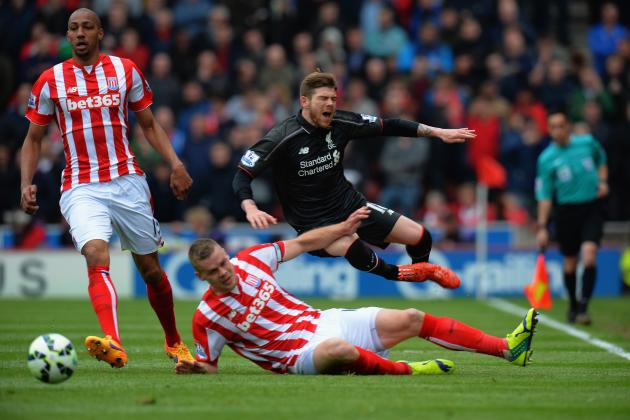 STOKE ON TRENT, ENGLAND - MAY 24: Ryan Shawcross of Stoke City tackles Alberto Moreno of Liverpool during the Barclays Premier League match between Stoke City and Liverpool at Britannia Stadium on May 24, 2015 in Stoke on Trent, England.  (Photo by Tony Marshall/Getty Images)