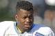 Carolina Panthers' Jonathan Stewart (28) arrives for practice during the NFL football team's training camp in Spartanburg, S.C., Sunday, Aug. 2, 2015. (AP Photo/Chuck Burton)