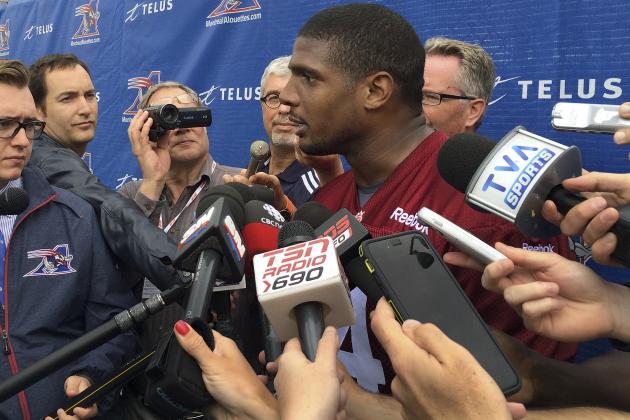 Montreal Alouettes defensive lineman Michael Sam speaks to reporters after returning to practice with the Canadian Football League team Monday, June 29, 2015, in Montreal. Sam, the first openly gay player drafted by an NFL team,  could not make the roster of the St. Louis Rams and signed with Montreal. He left the Alouettes for what he said were personal reasons, but returned to the team this week. (AP Photo/Jimmy Golen)