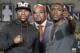 Boxers, Floyd Mayweather, Jr., left, and Andre Berto, right, pose for a photo at a news conference in Los Angeles on Thursday, Aug. 6, 2015. Mayweather Promotions, CEO Leonard Ellerbe, middle. Mayweather says Berto is a worthy opponent for the final fight of his perfect career. Three months after Mayweather dominated Manny Pacquiao in the most lucrative fight in boxing history, he began the difficult business of promoting his pay-per-view bout with Berto with a news conference in downtown Los Angeles. (AP Photo/Nick Ut)