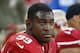 FILE - In this Nov. 23, 2014, file photo, San Francisco 49ers linebacker Aldon Smith sits on the bench during the second half of an NFL football game against the Washington Redskins in Santa Clara, Calif. Smith received second chance after second chance with the 49ers, who parted ways with their troubled linebacker Friday, Aug. 7, 2015, following his fifth run-in with the law. Santa Clara police arrested Smith on Thursday, and accused him of drunken driving, hit and run and vandalism. (AP Photo/Tony Avelar, File)