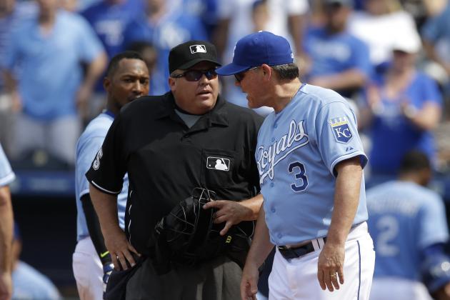 Kansas City Royals manager Ned Yost (3) argues the last out with home plate umpire Fieldin Culbreth (25) following a baseball game against the Texas Rangers at Kauffman Stadium in Kansas City, Mo., Saturday, June 6, 2015. The Rangers defeated the Royals 4-2. (AP Photo/Orlin Wagner)