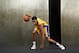 TARRYTOWN, NY - AUGUST 8: D'Angelo Russell #1 of the Los Angeles Lakers poses for a portrait during the 2015 NBA rookie photo shoot on August 8, 2015 at the Madison Square Garden Training Facility in Tarrytown, New York. NOTE TO USER: User expressly acknowledges and agrees that, by downloading and or using this photograph, User is consenting to the terms and conditions of the Getty Images License Agreement. Mandatory Copyright Notice: Copyright 2015 NBAE (Photo by Jennifer Pottheiser/NBAE via Getty Images)