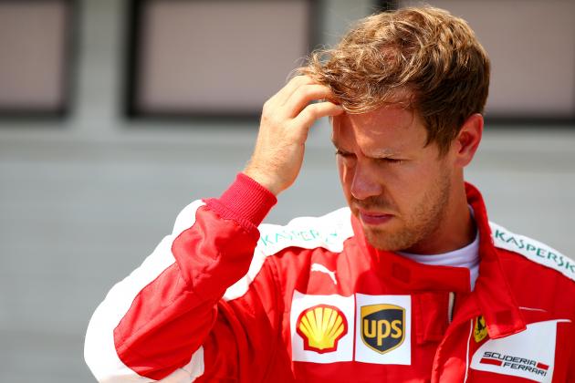 BUDAPEST, HUNGARY - JULY 25:  Sebastian Vettel of Germany and Ferrari looks on in Parc Ferme after claiming third position on the grid during qualifying for the Formula One Grand Prix of Hungary at Hungaroring on July 25, 2015 in Budapest, Hungary.  (Photo by Mark Thompson/Getty Images)