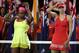Winner Serena Williams of the U.S., left, and runner-up Maria Sharapova of Russia, right, wait for the trophy presentation after the women's singles final at the Australian Open tennis championship in Melbourne, Australia, Saturday, Jan. 31, 2015. (AP Photo/Vincent Thian)