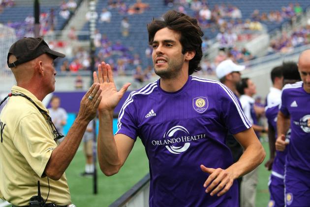 ORLANDO, FL - AUGUST 01: Kaka #10 of Orlando City SC high fives a security member as he runs onto the pitch prior to a MLS soccer match between the Columbus Crew SC and the Orlando City SC at the Orlando Citrus Bowl on August 1, 2015 in Orlando, Florida. (Photo by Alex Menendez/Getty Images)