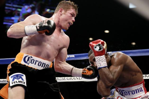 Canelo Alvarez, of Mexico,  Erislandy Lara, of Cuba during their super welterweight  fight, Saturday, July 12, 2014, in Las Vegas. (AP Photo/John Locher)