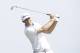 Dustin Johnson hits a shot on the third hole during the first round of the PGA Championship golf tournament Thursday, Aug. 13, 2015, at Whistling Straits in Haven, Wis. (AP Photo/Brynn Anderson)