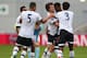 MANCHESTER, ENGLAND - AUGUST 14: Christian Maghoma of Tottenham Hotspur U21 celebrates with Filip Lesniak after scoring their third goal during the Barclays U21 Premier League match between Manchester City U21 and Tottenham Hotspur U21 at The Academy Stadium on August 14, 2015 in Manchester, England. (Photo by Alex Livesey/Getty Images)