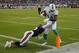 Miami Dolphins wide receiver Jarvis Landry (14) scores a touchdown as he's hoot by Chicago Bears free safety Brock Vereen (45) during the first half of an NFL preseason football game in Chicago, Thursday, Aug. 13, 2015. (AP Photo/Charles Rex Arbogast)