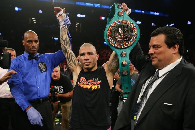 NEW YORK, NY - JUNE 6: Miguel Cotto celebrates his 4th round knockout win over Daniel Geale to retain his WBC middleweight world title at the Barclays Center on June 6, 2015 in the Brooklyn borough of New York City. (Photo by Ed Mulholland/Getty Images)