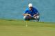 Aug 16, 2015; Sheboygan, WI, USA; Jordan Spieth lines up his putt on the 13th green during the final round of the 2015 PGA Championship golf tournament at Whistling Straits. Mandatory Credit: Thomas J. Russo-USA TODAY Sports