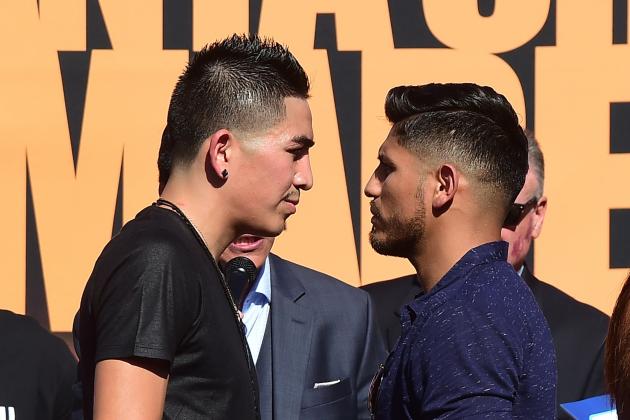 Undefeated two-Division World Champion Leo 'El Terremoto' Santa Cruz (L) and former three-division world champion Abner Mares (R)  face off at a press conference in Los Angeles on July 14, 2015, to announce their 12-round featherweight fight taking place on August 29 in Los Angeles. AFP PHOTO/ FREDERIC J. BROWN        (Photo credit should read FREDERIC J. BROWN/AFP/Getty Images)