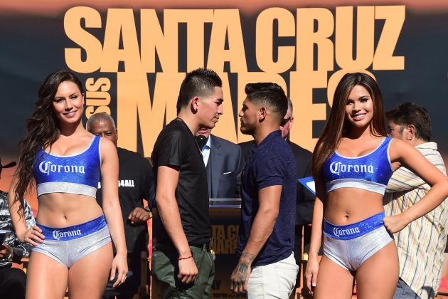 Undefeated two-Division World Champion Leo 'El Terremoto' Santa Cruz (L) and former three-division world champion Abner Mares (R)  face off at a press conference in Los Angeles on July 14, 2015, to announce their 12-round featherweight fight taking place on August 29 in Los Angeles. AFP PHOTO/ FREDERIC J. BROWN        (Photo credit should read FREDERIC J. BROWN/AFP/Getty Images)