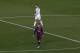 Barcelona's Argentinian forward Lionel Messi (DOWN) and Real Madrid's Portuguese forward Cristiano Ronaldo walk on the field during the 'clasico' Spanish league football match FC Barcelona vs Real Madrid CF at the Camp Nou stadium in Barcelona on March 22, 2015. AFP PHOTO / QUIQUE GARCIA (Photo credit should read QUIQUE GARCIA/AFP/Getty Images)