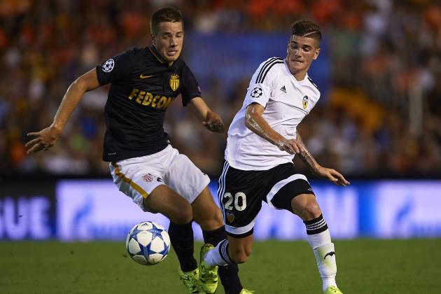 VALENCIA, SPAIN - AUGUST 19:  Rodrigo De Paul (R) of Valencia battle for the ball with Mario Pasalic of Monaco during the UEFA Champions League Qualifying Round Play Off First Leg match between Valencia CF and AS Monaco at Mestalla Stadium on August 19, 2015 in Valencia, Spain.  (Photo by Manuel Queimadelos Alonso/Getty Images)