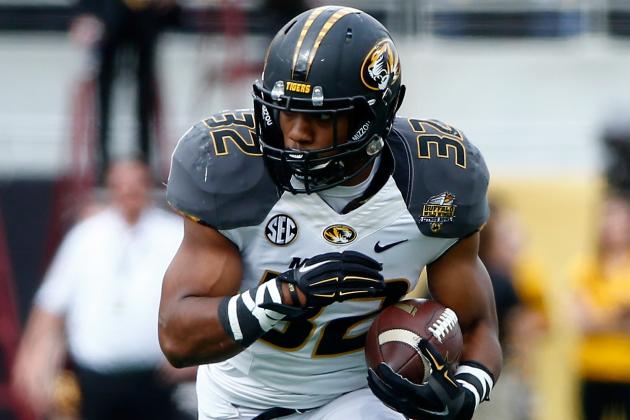 ORLANDO, FL - JANUARY 01:  Russell Hansbrough #32 of the Missouri Tigers runs for yardage during the Buffalo Wild Wings Citrus Bowl against the Minnesota Golden Gophers at the Florida Citrus Bowl on January 1, 2015 in Orlando, Florida.  (Photo by Sam Greenwood/Getty Images)