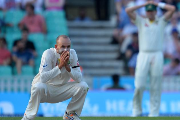 Australia's Nathan Lyon (L) reacts during play on the third day of the fifth Ashes cricket test match between England and Australia at The Oval cricket ground in London, on August 22, 2015. AFP PHOTO / GLYN KIRK

RESTRICTED TO EDITORIAL USE. NO ASSOCIATION WITH DIRECT COMPETITOR OF SPONSOR, PARTNER, OR SUPPLIER OF THE ECB        (Photo credit should read GLYN KIRK/AFP/Getty Images)