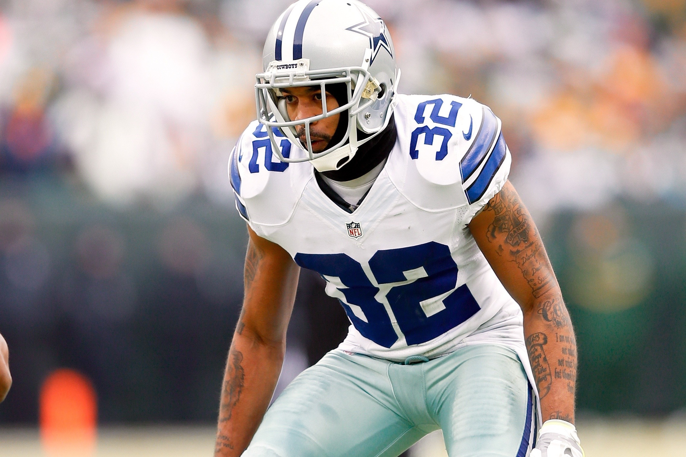 Dallas Cowboys cornerback Orlando Scandrick, left, has a