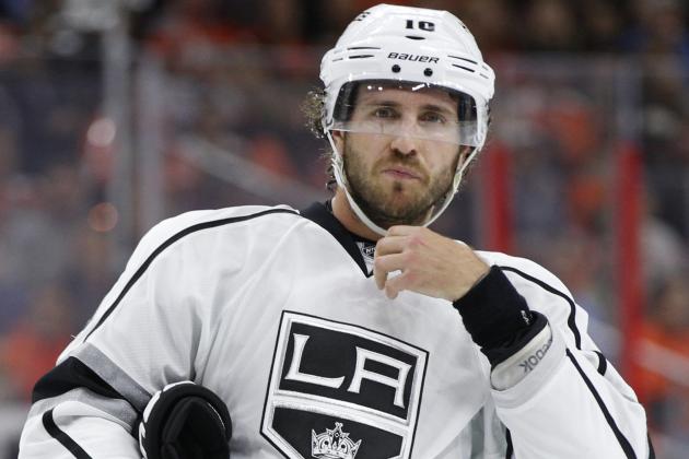 FILE - This is an Oct. 28, 2014, file photo showing Los Angeles Kings' Mike Richards during the first period of an NHL hockey game against the Philadelphia Flyers in Philadelphia. The NHL players' union has filed a grievance on behalf of Mike Richards against the Los Angeles Kings, contesting his contract termination. The Kings terminated Richards' contract in late June for what they called